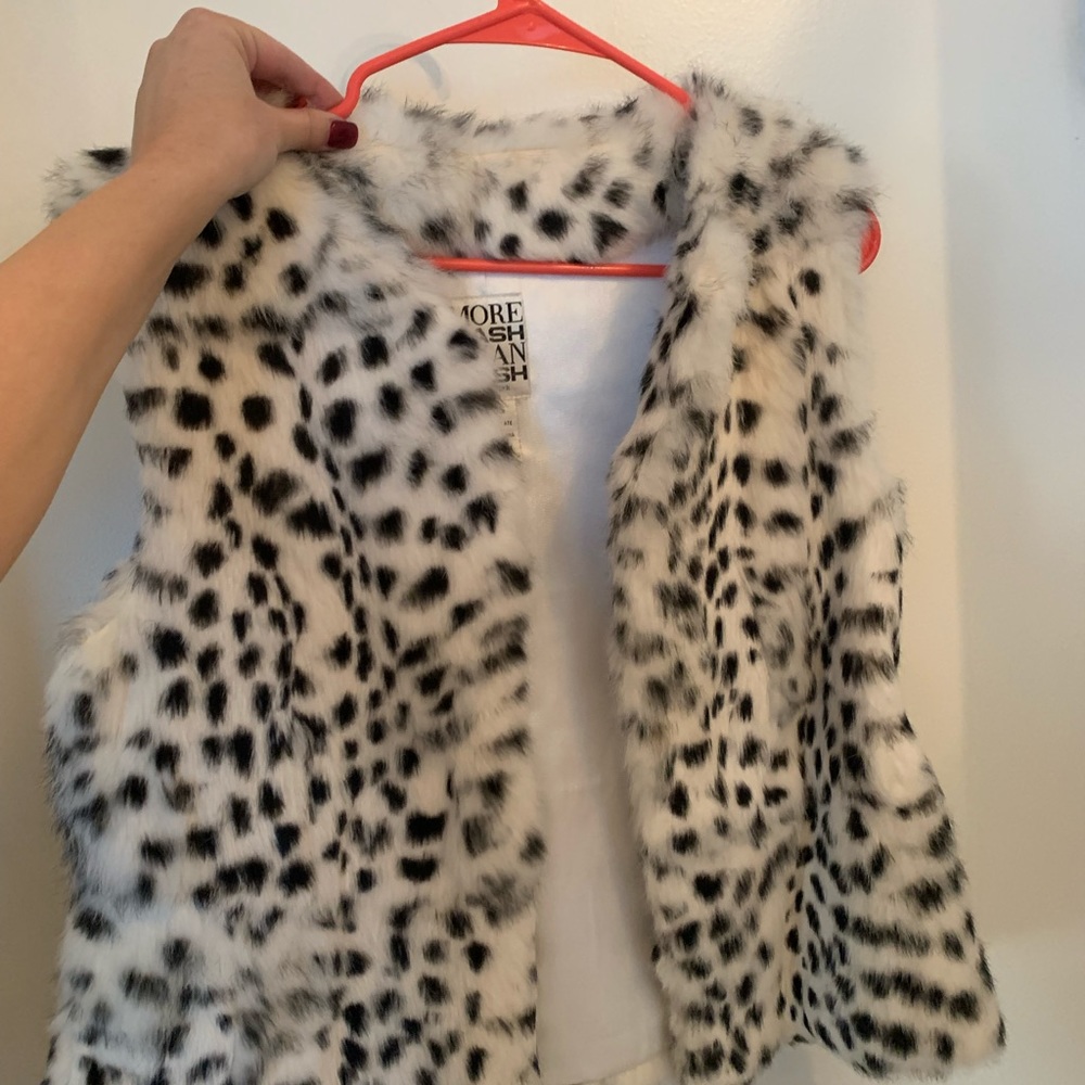 Real fur vest. Never been worn